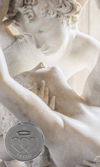 Lovers carved from marble with tarot coin